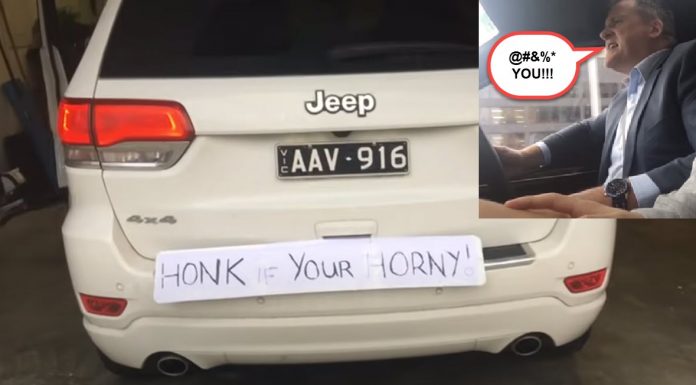 Son Puts Sign On Back Of Grouchy Dad’s Jeep, Then Record’s His Hilarious Reaction