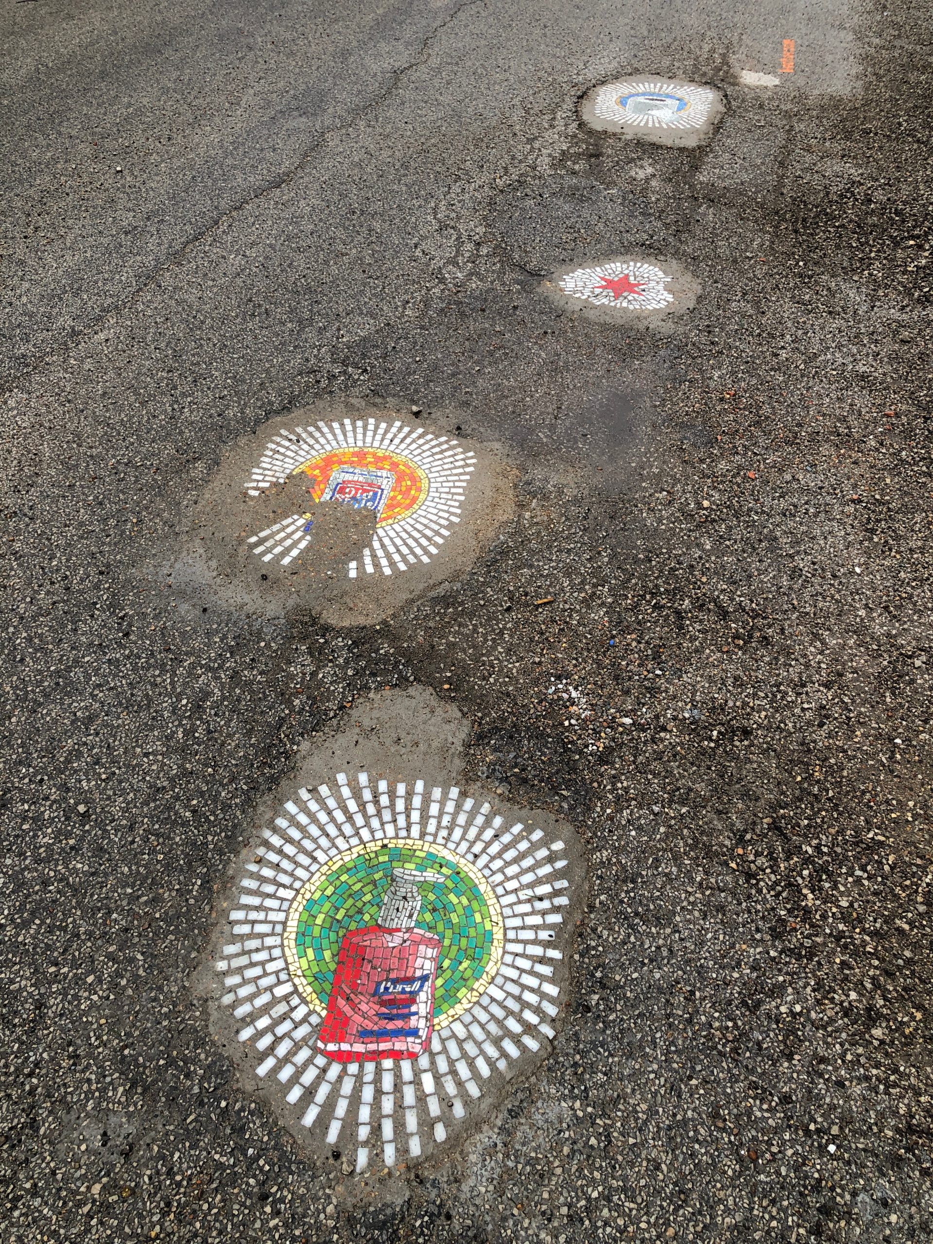 four pothole arts by Jim Bachor