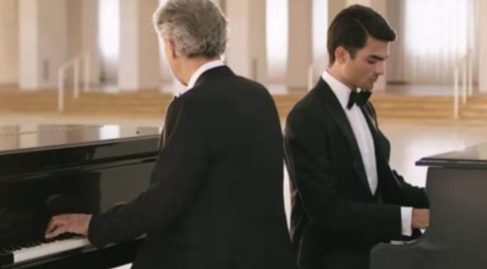 Andrea Bocelli and Matteo Bocelli playing piano together