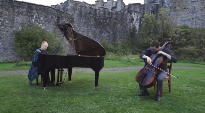 cello piano drum corp perform fight song highlands castle background