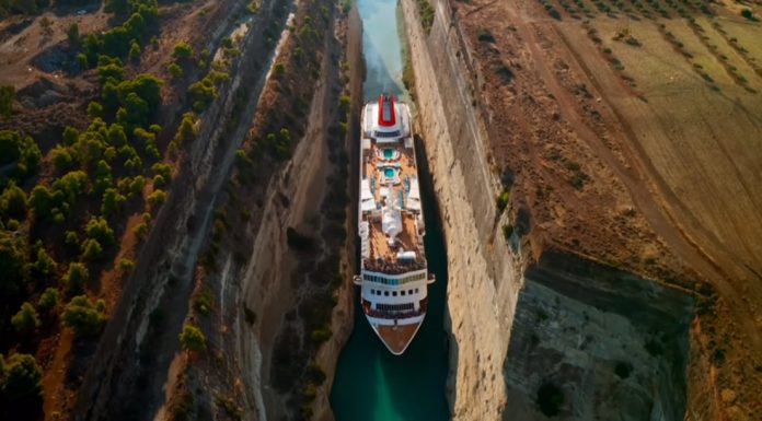 Drone Captures Massive Cruise Ship Passing Through a Canal With Inches to Spare MS Braemar cruise ship passing through Corinth Canal in Greece