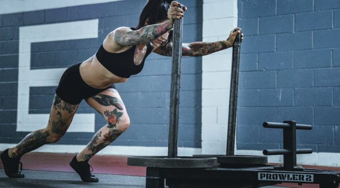 Top 5 Reasons People With Mental Illnesses Are Strong AF tattooed woman training