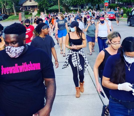 Black Man Afraid to Walk in His Neighborhood, So Hundreds Join Him neighborhood walking